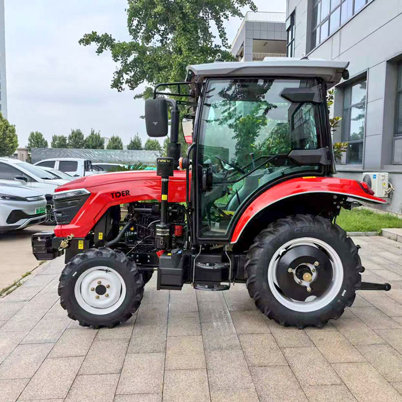 Tractor utilitario compacto de 35 CV con cabina para cultivos frutales.