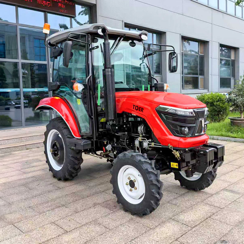 Tractor utilitario compacto de 35 CV con cabina para cultivos frutales.