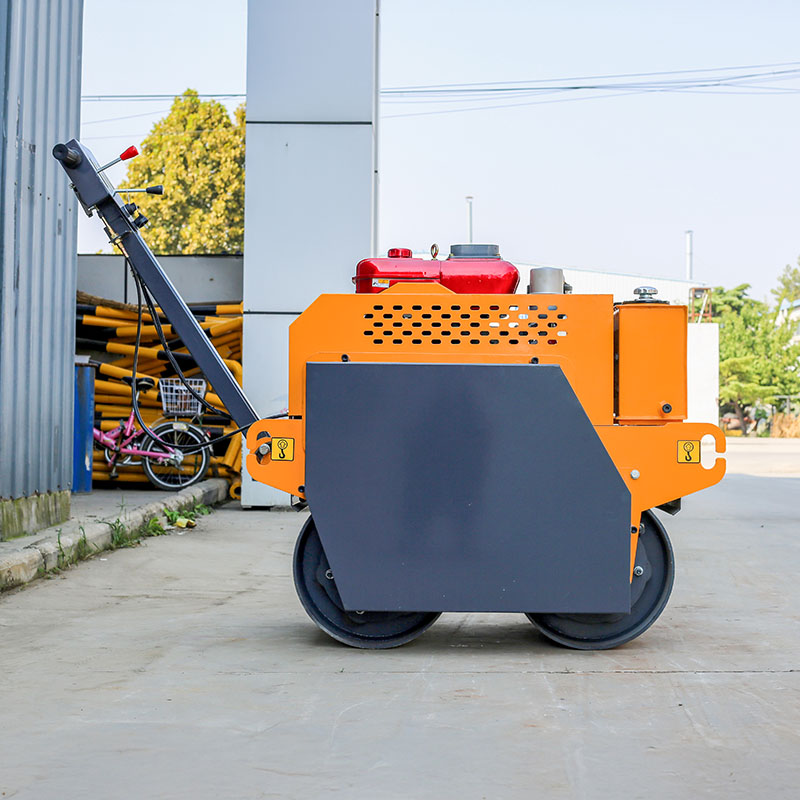 Rodillo compactador de doble tambor de 600 kg con operador a pie y fácil mantenimiento.